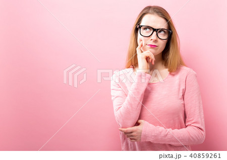 Young woman in a thoughtful pose 40859261