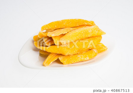 Dried Mango or Dried Mango slices on a background. Dried Mango or Dried Mango slices on a background. 40867513