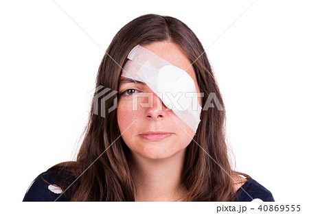 Portrait of woman wearing eye patch as protection after injury 40869555