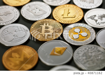 Pattern of coins LTC, ETH, BTC, XMR, XRP on a dark background. Business concept. Pattern of coins LTC, ETH, BTC, XMR, XRP on a dark background. Business concept. 40871162