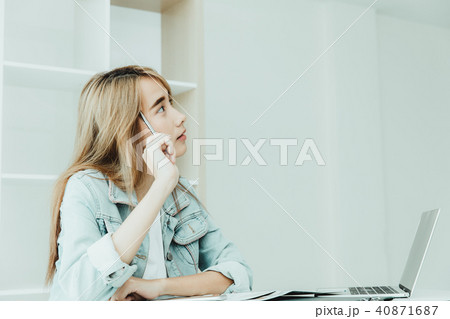 Asian young employee thinking or inattentive 40871687