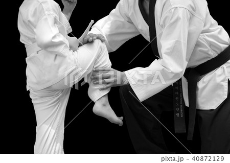 Man Teaching Taekwondo Fighter Kid Balance 40872129