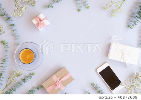 Gift boxes with green leaves 40872609