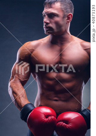 Man in boxing gloves Man in boxing gloves 40873193