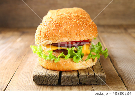 Tasty homemade burger consisting of bun Tasty homemade burger consisting of bun 40880234