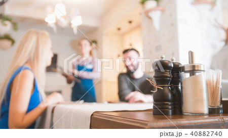 Guy talks to a girl in a cafe Guy talks to a girl in a cafe 40882740