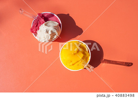 ice cream in paper cups orange table ice cream in paper cups orange table 40883498