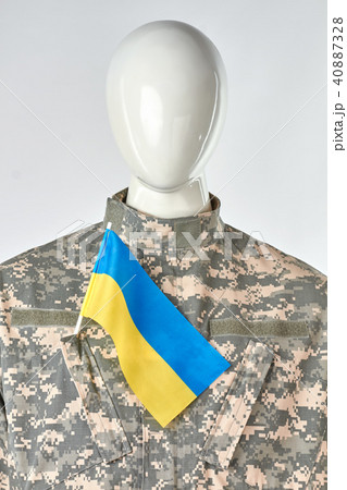 Portrait of mannequin in military uniform with ukrainian flag. Portrait of mannequin in military uniform with ukrainian flag. 40887328
