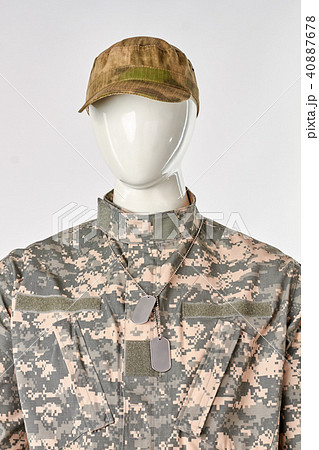Look of soldier with cap and dog tag, front view. Look of soldier with cap and dog tag, front view. 40887678