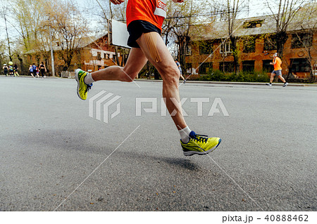 male runner with kinesiology tape 40888462