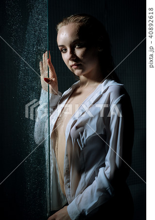 Sexy woman having shower in the dark Sexy woman having shower in the dark 40892618