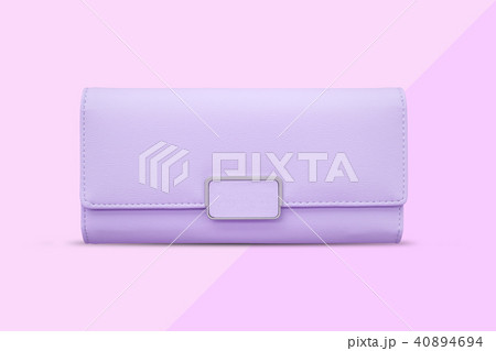 Purple wallet on pink paper background. Purple wallet on pink paper background. 40894694