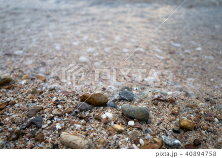 Sea waves on the beach with full of stones Sea waves on the beach with full of stones 40894758