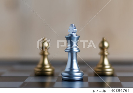 The silver King chess set on board is located and 40894762