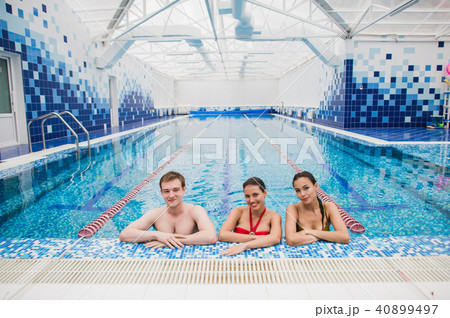 happy friends at swimming pool class learning to swim and have fun happy friends at swimming pool class learning to swim and have fun 40899497
