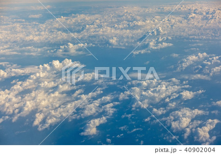 sunrise above clouds from airplane window sunrise above clouds from airplane window 40902004