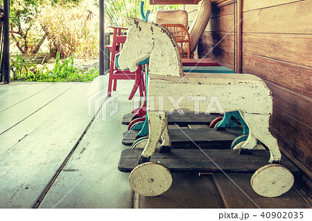 Vintage rocking hourse in old house. Vintage rocking hourse in old house. 40902035