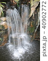 Gloomy waterfall 40902772