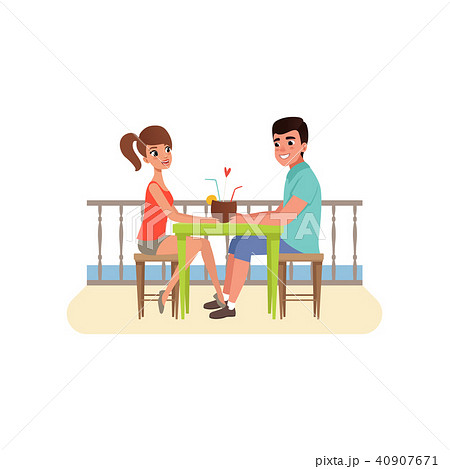 Family couple sitting at the cafe near the beach and drinking cocktail, man and woman on romantic 40907671