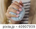 Beautiful female hand with manicure  40907939