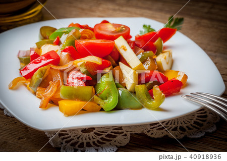 Ratatouille on a rustic table. Ratatouille on a rustic table. 40918936