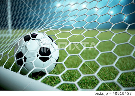 3d rendering soccer ball in goal. Soccer ball in net with spotlight and stadium light background 3d rendering soccer ball in goal. Soccer ball in net with spotlight and stadium light background 40919455