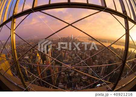 New York City skyline with Manhattan skyscrapers at dramatic stormy sunset, USA. 40921216