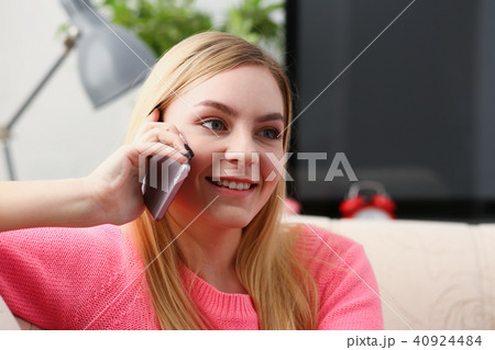 young beautiful woman talking on the phone 40924484
