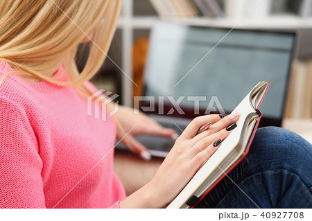 young beautiful woman read book study hard prepare for exam 40927708