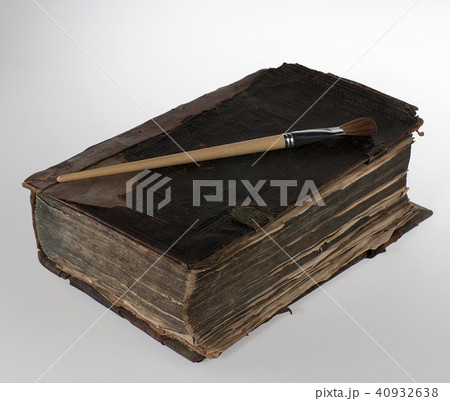 old book and brush on white background 40932638