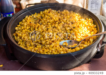 Cooking corn kernels. 40933249