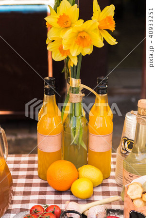 Flowers are in the bottle. 40933251
