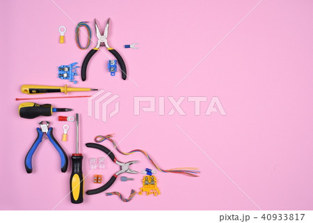 Set of electrical tools on pink background Set of electrical tools on pink background 40933817