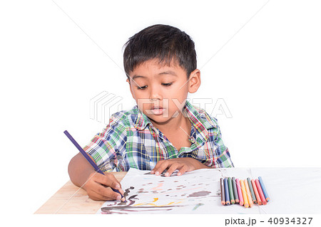 Cute little boy painting on book drawing Cute little boy painting on book drawing 40934327