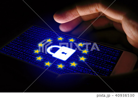 GDPR Concept with man using smartphone and lock GDPR Concept with man using smartphone and lock 40936530
