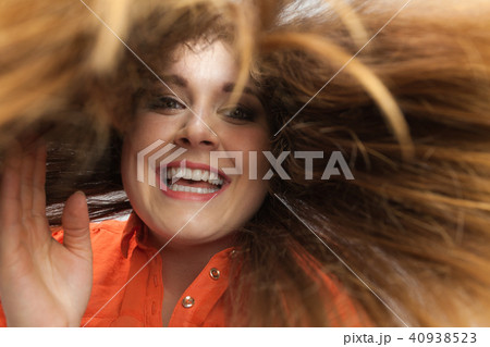 Happy positive woman with long brown hair 40938523