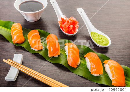 sushi with salmon on a leaf sushi with salmon on a leaf 40942004