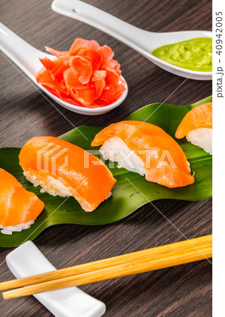 sushi with salmon on a leaf sushi with salmon on a leaf 40942005