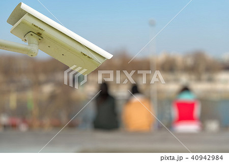 security CCTV camera with tourists on background 40942984