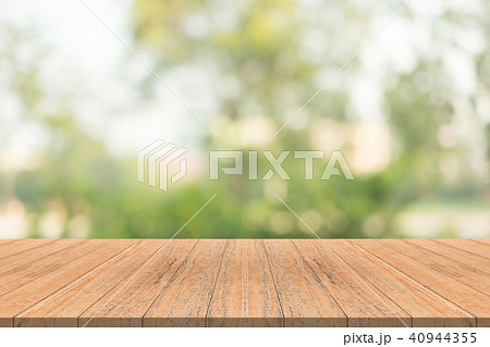 Empty wood table top blurred background Empty wood table top blurred background 40944355