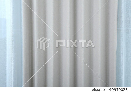 背景素材 グレーのカーテンの写真素材