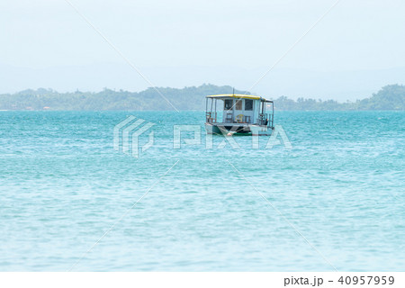 Lonely catamaran boat anchored on the sea 40957959