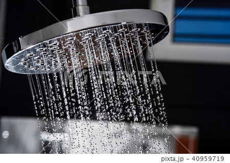 Water flowing from shower in the bathroom Water flowing from shower in the bathroom 40959719