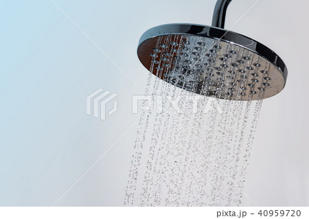 Water flowing from shower in the bathroom 40959720