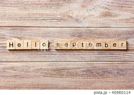 hello September word written on wood block. hello September word written on wood block. 40960114