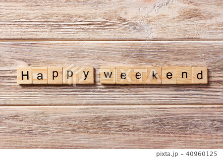 happy weekend word written on wood block. 40960125