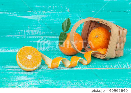 orange fruit on color table background. 40965640