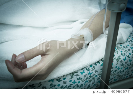 a hand of a patient during a surgical operation a hand of a patient during a surgical operation 40966677