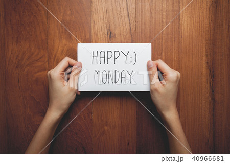 a woman with a sign with the words in her hand 40966681