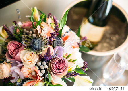 wedding bouquet boutonniere bottle of champagne 40967151